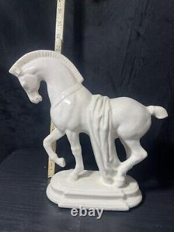 ANTIQUE HEAVY, PORCELAIN 11 3/4 TALL PRANCING HORSE FIGURINEBASE 4 1/2 x 8