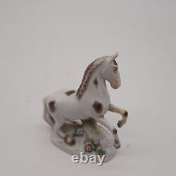 Antique Meissen porcelain horse rearing up brown and white