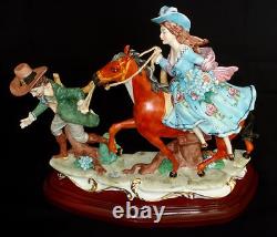 CAPODIMONTE Porcelain Figurine Man Pulling Lady on Horse Signed Fornili Italy