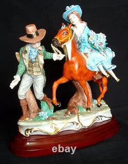 CAPODIMONTE Porcelain Figurine Man Pulling Lady on Horse Signed Fornili Italy