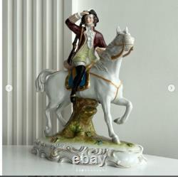 Collectible porcelain figurine Hunter on Horse by Capodimonte. Current seal an