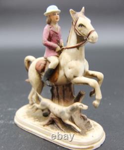 Collection of Porcelain Horse Figurines in Various Poses, Colors, and Sizes