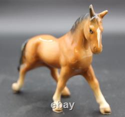 Collection of Porcelain Horse Figurines in Various Poses, Colors, and Sizes