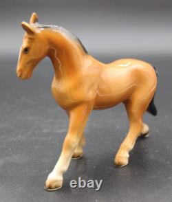 Collection of Porcelain Horse Figurines in Various Poses, Colors, and Sizes Collection of Porcelain Horse Figurines in Various Poses, Colors, and Sizes