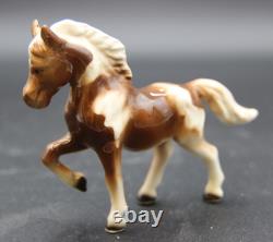 Collection of Porcelain Horse Figurines in Various Poses, Colors, and Sizes Collection of Porcelain Horse Figurines in Various Poses, Colors, and Sizes