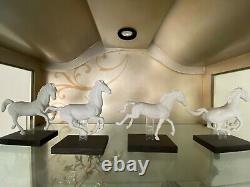 Exquisite set of four Lladro porcelain horse figures