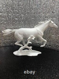 Kaiser White Bisque Porcelain Racing Horse Figurine by G. Bochmann