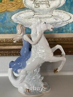 Lady and horse figurine