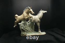 Lladro Galloping Horses, porcelain retired. Mint condition