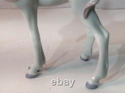 Lladro Unicorn Standing Looking at a Bird on her Tail, 05993