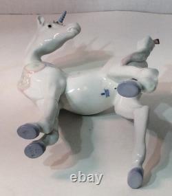 Lladro Unicorn Standing Looking at a Bird on her Tail, 05993