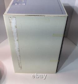 Lladro Unicorn Standing Looking at a Bird on her Tail, 05993