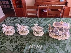 Porcelain horse-drawn carriage and 3 Sets Of Horses. Purchased In 1999 In Romani