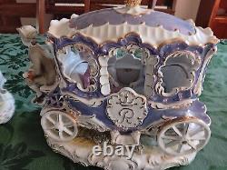 Porcelain horse-drawn carriage and 3 Sets Of Horses. Purchased In 1999 In Romani